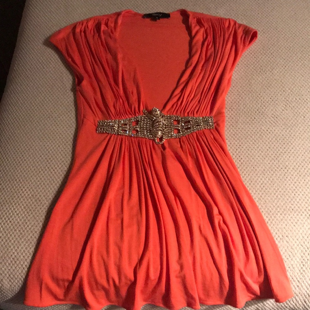 Low cut orange shirt with rhinestone tiger